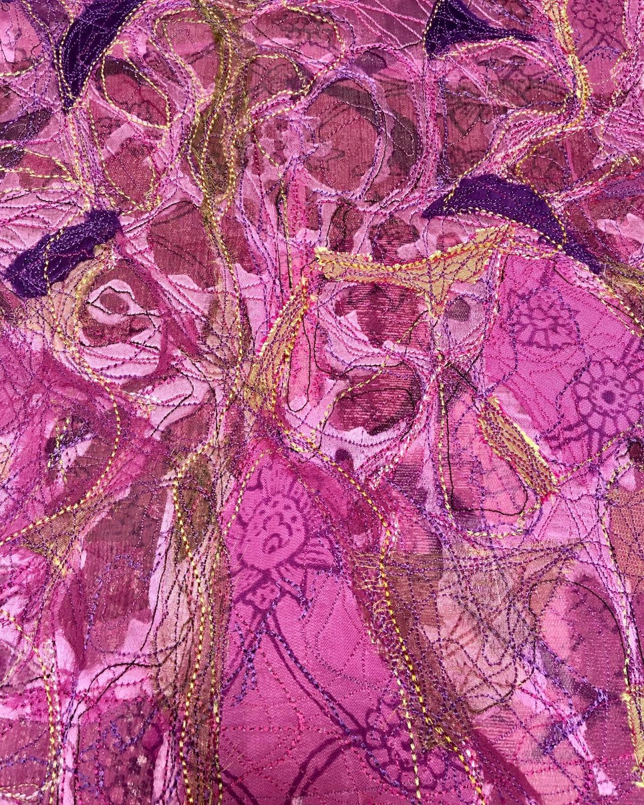 Justina working with textile materials